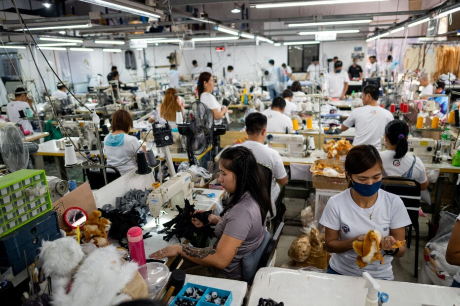 Workers make realistic pet plushies at the Pampanga Teddy Bear Factory, in Angeles City