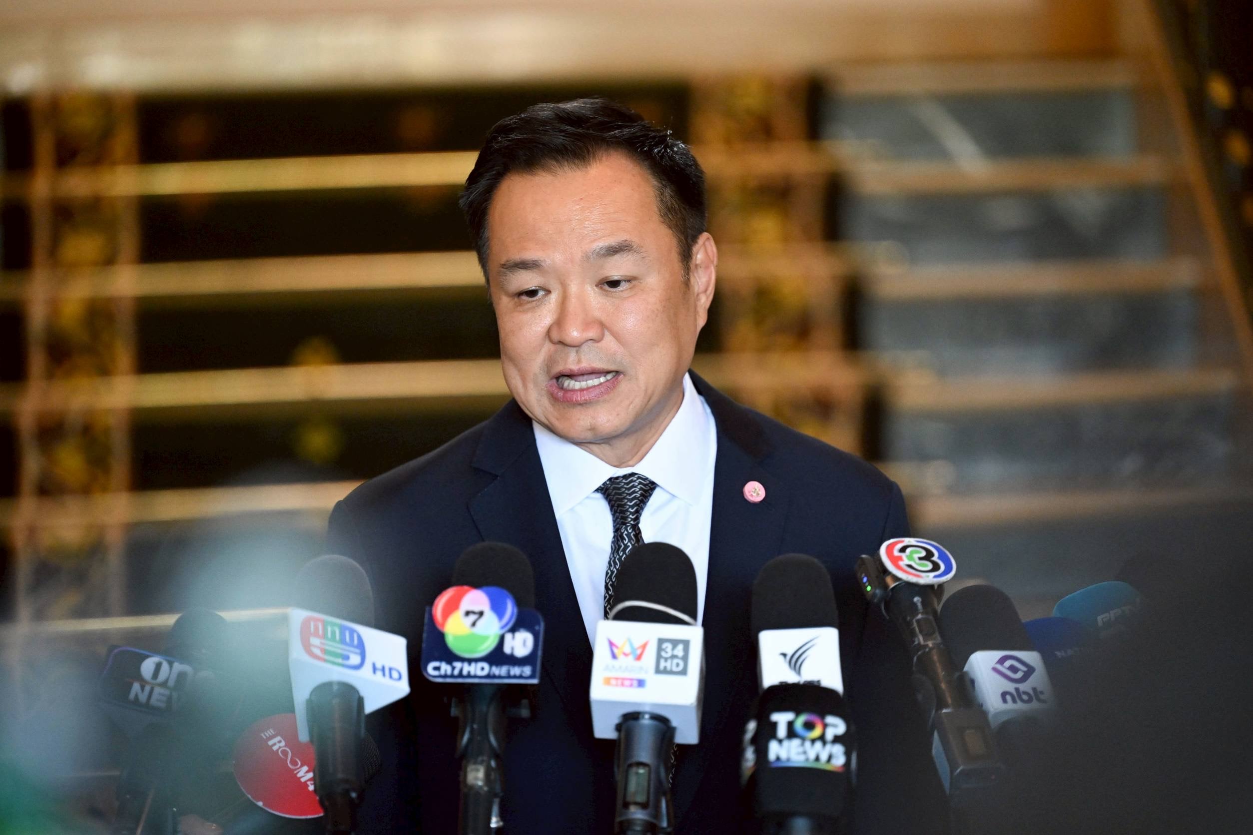 Thai Political News: Official Warnings, IO Harassment, and MP Assassination Probe